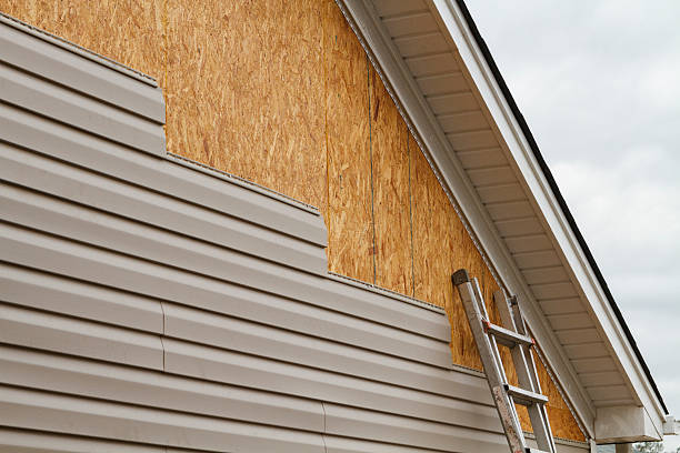 Professional Siding technician working in Osterburg, PA